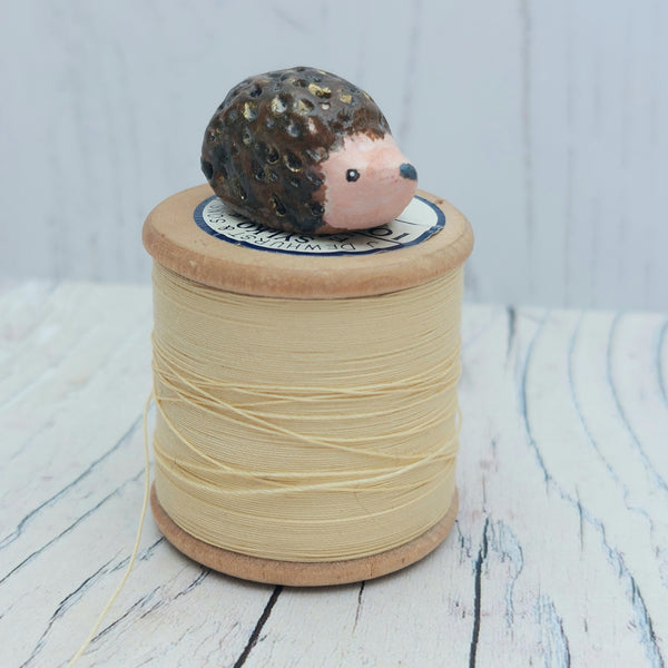 Teeny tiny clay hedgehog