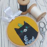 Cat and frog wall art