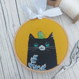 Cat and frog wall art