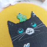 Cat and frog wall art