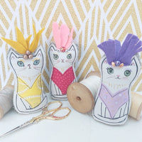 Copacabana cats.  Fun showgirl cat ornament