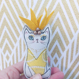 Copacabana cats.  Fun showgirl cat ornament