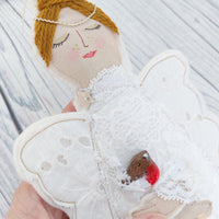 Angel with a robin. Handmade decoration.