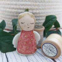 Tiny fabric angel