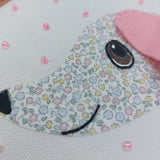 Floral sausage dog art