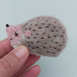 Tiny felt hedgehog ornament