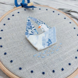 Broken pottery art - goose in a boat