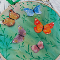 Butterfly hoop art.
