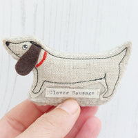 Clever Sausage, cute dachshund minature, celebration sausage dog