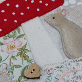 Mouse under a toadstool hoop art.